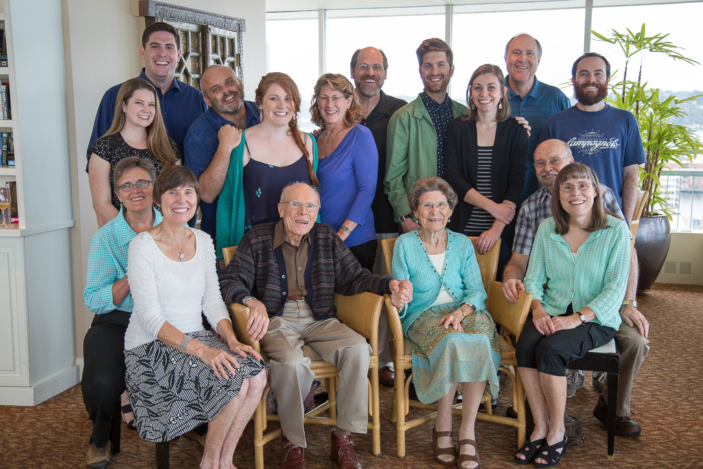 2015 — 90th Birthday celebration for Mom and Dad. Standing: Kendall, Jesse, Tom, Anna, Donelyn, Mike G., Kevin, Katie, Pat, Joe. Sitting: Clare, Mary, Dad, Mom, Mike P., Esther. Hosted by Donelyn's mom Phyllis at Parkshore, Madison Park, Seattle.